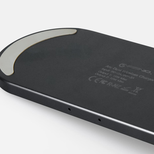 A black wireless charger with a curved design and a silver accent. It features branding on the surface.