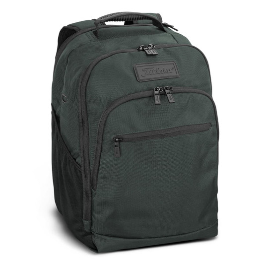 A green backpack with a textured surface, featuring multiple zippered compartments and a branded logo.