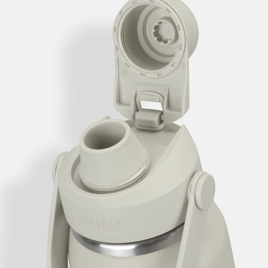 A drink bottle in light grey with a screw-on lid and spout, featuring a logo on the body.