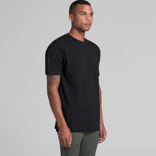 A black t-shirt with a straight fit, featuring short sleeves and a round neckline, worn by a male model.
