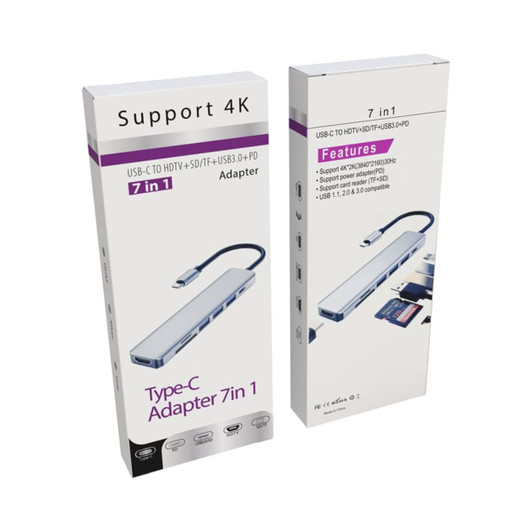 A Type-C adapter in a box, featuring multiple ports including HDMI and USB, displayed in a white package with branding.