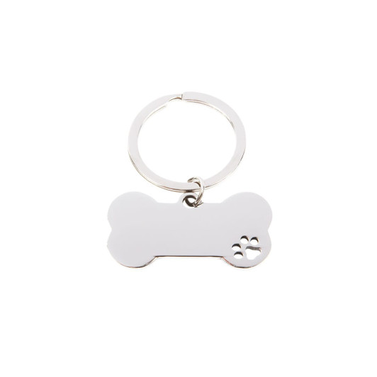 A silver keytag in the shape of a dog bone with a paw print design. It features a split ring for attachment.