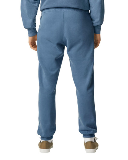 Lightweight sweatpants in a soft blue hue, featuring an elastic waistband and a tapered fit.