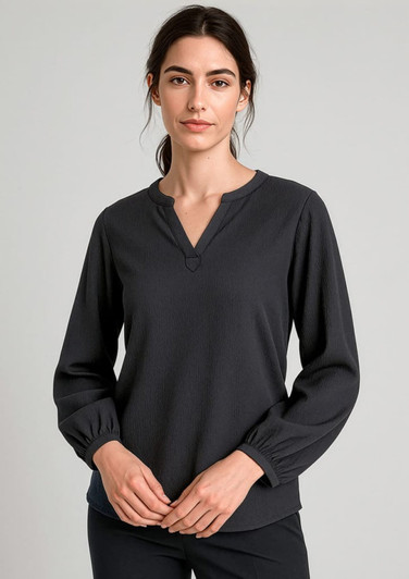 A dark grey long sleeve blouse with a relaxed fit and a v-neckline. The blouse features gathered sleeves and a logo.