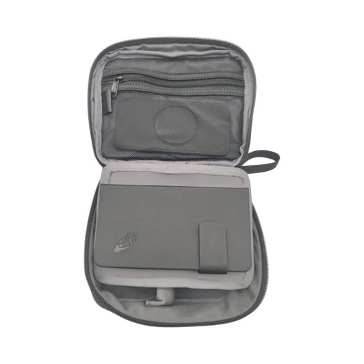 A grey accessory pouch opened, revealing a zippered pocket and a compartment for items. It includes a logo.