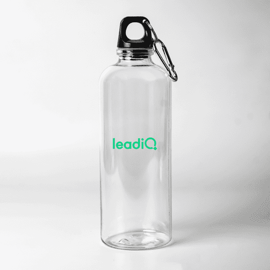 A drink bottle made of clear plastic with a black lid and a carabiner, featuring a logo.