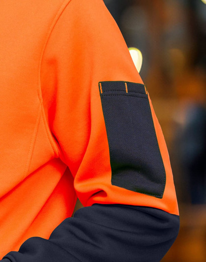 A Hi-Vis two-tone water-resistant fleece hoodie in bright orange and black, featuring a contrast pocket on the sleeve.