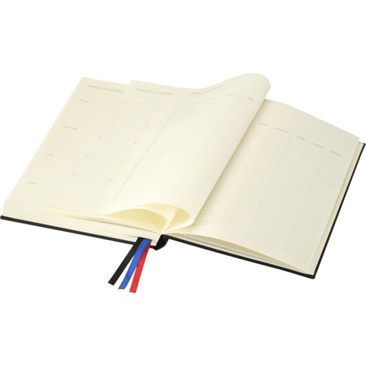 A black diary with cream pages, featuring ribbon bookmarks in blue, red, and black. It has a logo on the cover.
