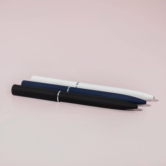A set of three ballpoint pens in white, navy blue, and black with a mirror finish and a logo.