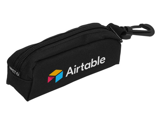 A black pouch with a zip closure and a clip, featuring a logo on the side.