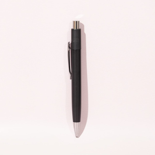 A metal ballpoint pen in black, featuring a clip and a silver tip, with a logo on the barrel.