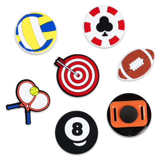 A collection of seven custom shoe charms in various colours, featuring sports and gaming designs like volleyball, poker, and darts.