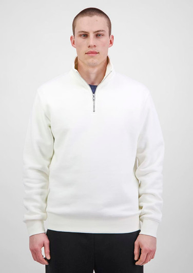 A model wearing a white 1/4 zip jumper stands against a plain background. The jumper includes a logo.