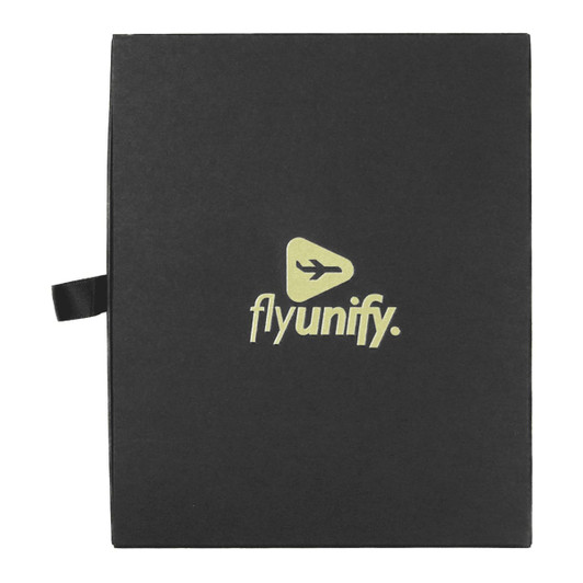 A black travel gift set with a gold logo, featuring a handle for easy carrying.