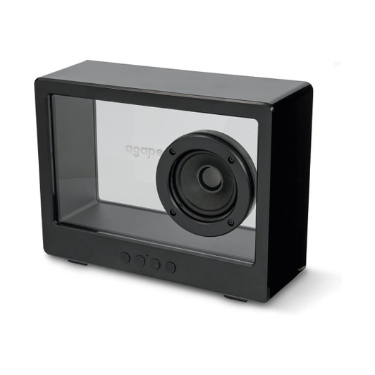 A black speaker with a transparent casing and a round speaker cone visible on one side, featuring control buttons underneath.