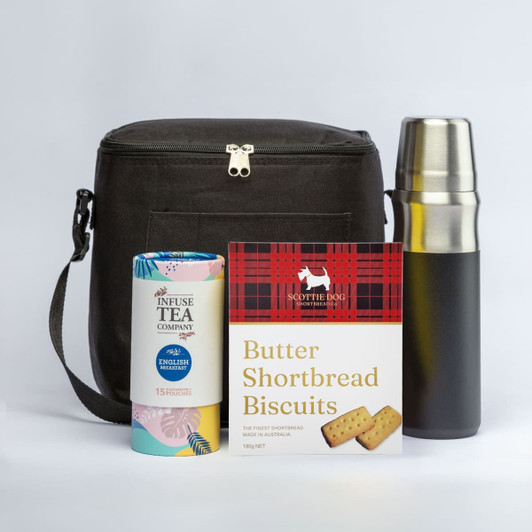 A cooler bag in dark grey, a stainless steel drink bottle, and a box of butter shortbread biscuits.