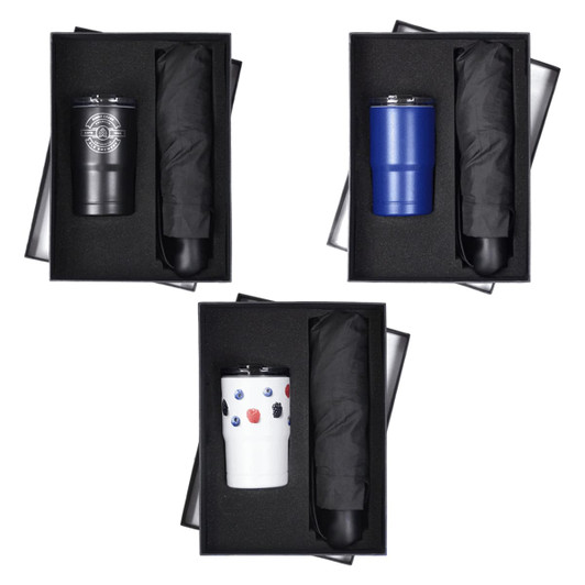 A drink bottle and an umbrella in a black gift box, featuring assorted colours: black, blue, and white with patterns.