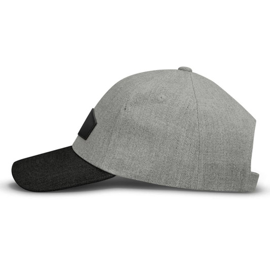 A grey cap with a black peak and a patch on the side, featuring a simple design.