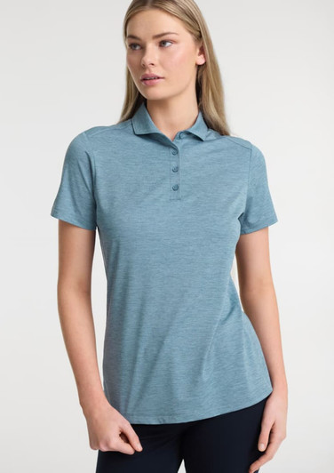 A women’s short sleeve polo in a light blue colour featuring a classic collar and a subtle logo.