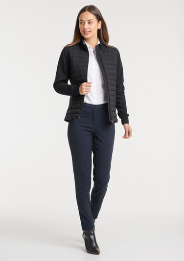 A women's tailor jacket in black, paired with a white shirt and navy trousers, featuring a sleek, contemporary design.