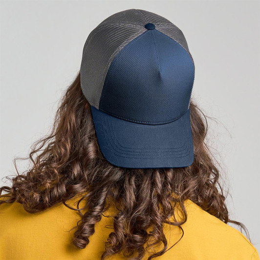 A trucker cap in navy with a grey mesh back, displayed from the rear, featuring a logo.