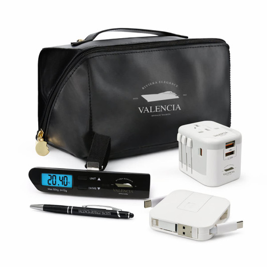A black travel bag with a clock, pen, power adapter, and USB charger, featuring a logo on the bag.
