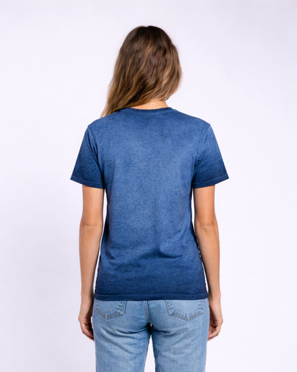 A blue Colortone® Oil Wash T-Shirt from the back, featuring short sleeves and a slight texture.