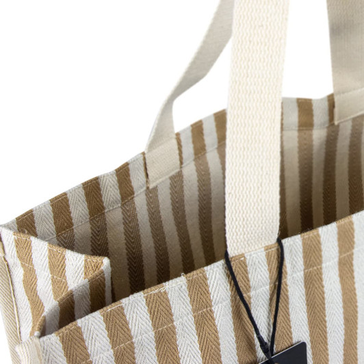 A striped beige and white tote bag with sturdy handles and an interior pocket, featuring a logo.