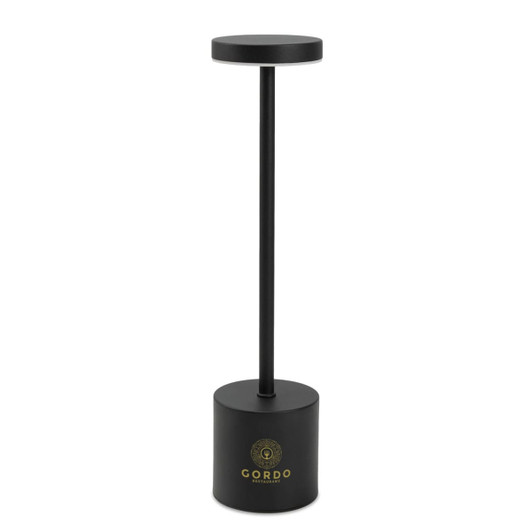 A black rechargeable table lamp with a cylindrical base and a circular top, featuring a logo on the base.