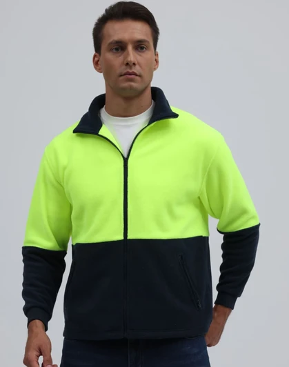 A Hi-Vis polar fleece full zip jacket in bright yellow and navy, featuring a zip and pockets, modelled by a person.