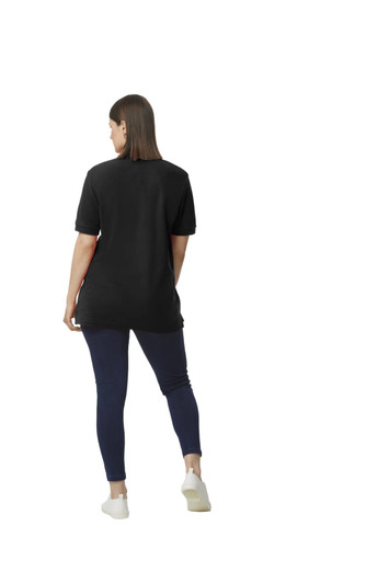 A black Gildan Hammer Adult Double Pique Polo worn by a woman, displayed from the back, paired with navy leggings.