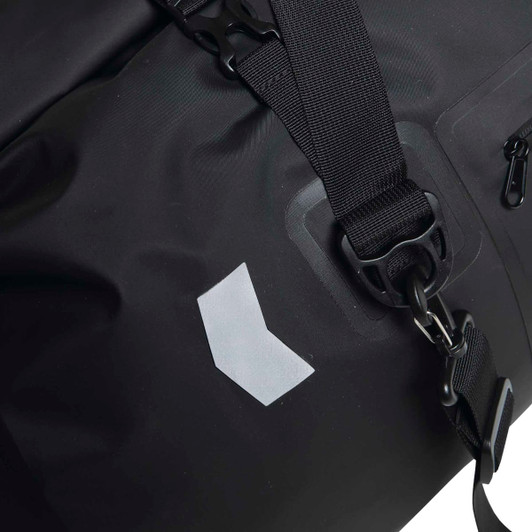 A black duffle bag with a textured surface and adjustable straps, featuring a small logo.