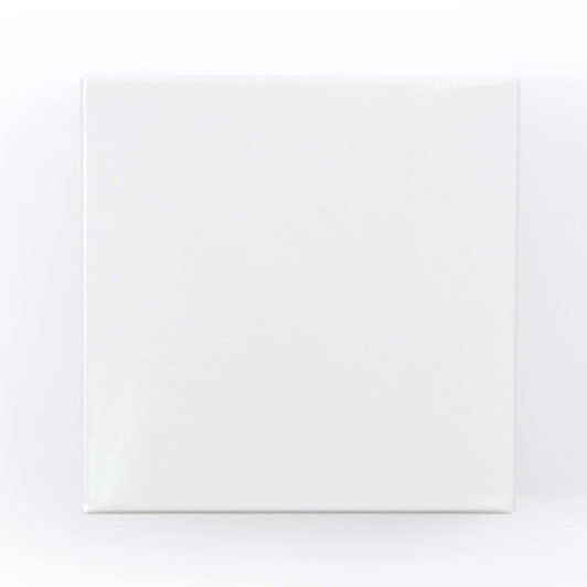 A white cardboard box with a smooth surface and no visible branding or graphics.