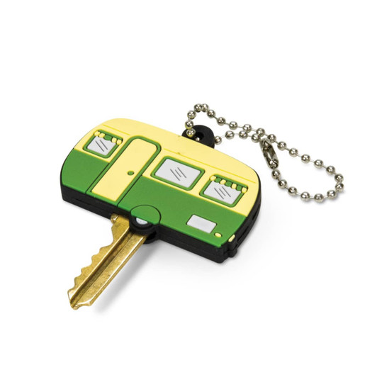 A green and yellow PVC key cover shaped like a caravan, attached to a ball chain.