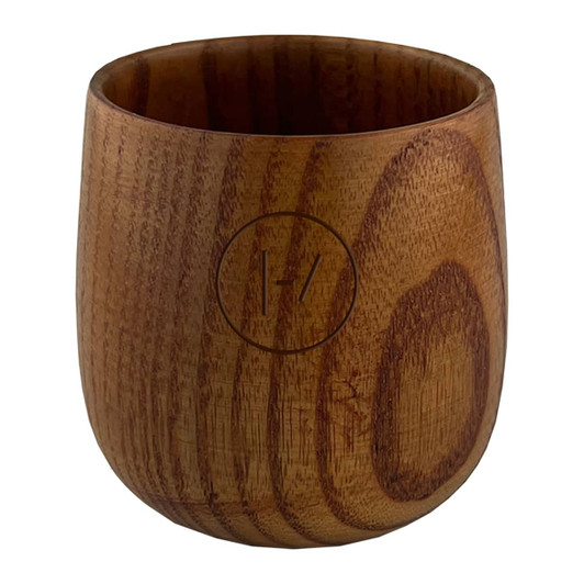 A wooden coffee cup in a warm brown tone, featuring a circular logo on the side.
