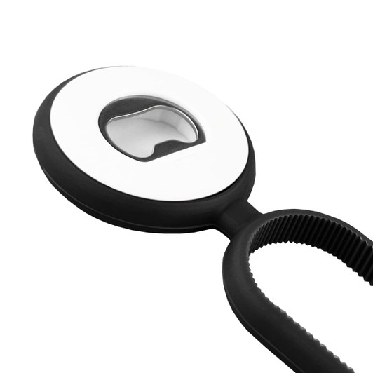 A drink bottle opener in black and white, featuring a circular design with a built-in bottle opener and a textured grip.