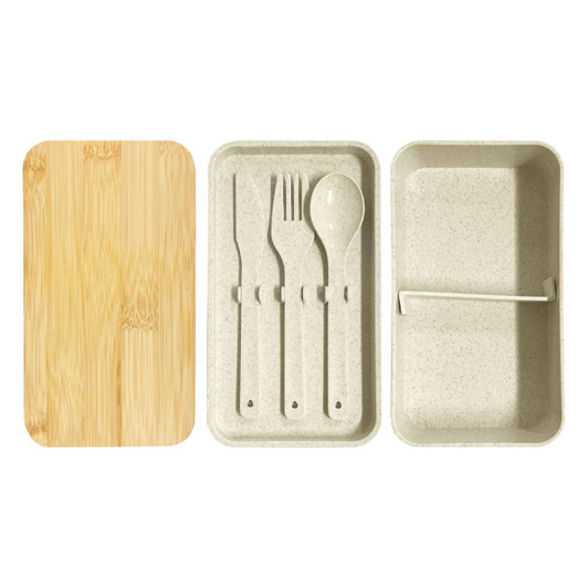A wheat straw lunch box pack in beige with a bamboo lid and included utensils: fork, knife, and spoon.