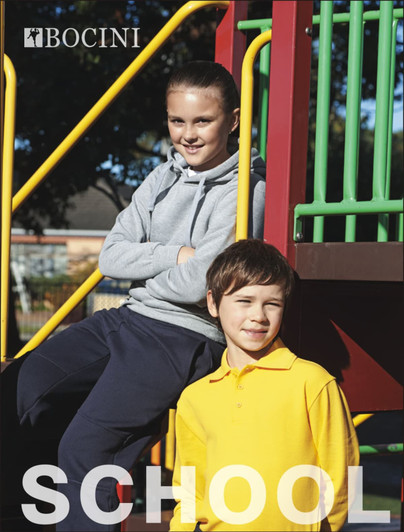 Kids in a playground wearing a grey hoodie and navy double-knee track pants, with a bright yellow polo shirt.