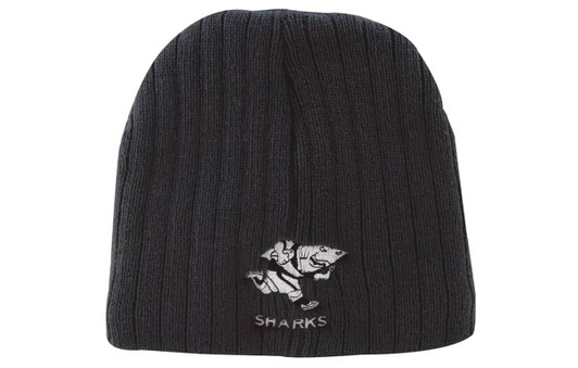 A black cable knit beanie featuring an embroidered logo of a shark character.