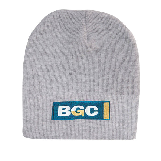 A grey acrylic beanie featuring a logo patch in blue and gold. It has a rolled-down design.