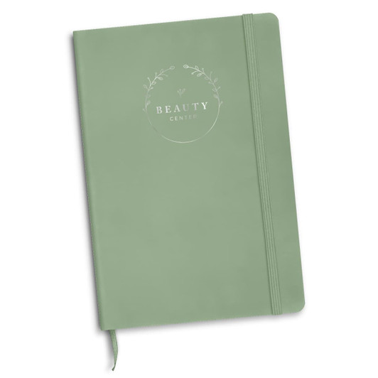 A green foil-printed notebook with a logo and an elastic closure, suitable for office and business use.