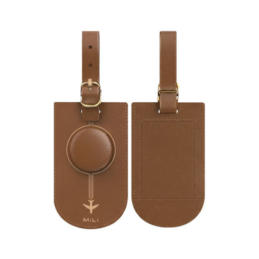 A brown leather luggage tag with a circular attachment and a strap, featuring a logo.