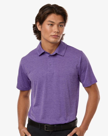 A men's polo shirt in a vibrant purple heather melange, featuring a collar and short sleeves. It has a branding logo.