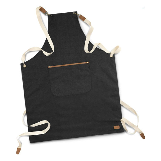 A dark grey canvas apron with cream straps and a front pocket, featuring a small logo.