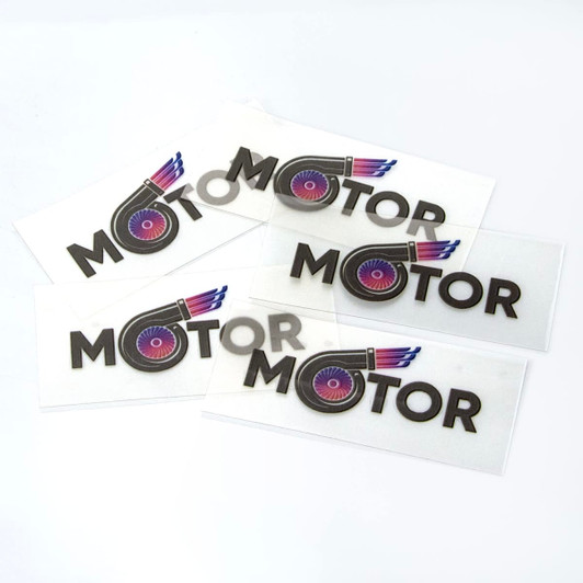 A collection of stickers featuring the word "MOTOR" in black with a graphic element in purple and pink, on a white background.