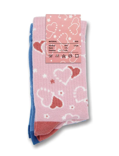 A set of two kids' socks featuring hearts, one pink with white and red hearts and the other blue with pink details.