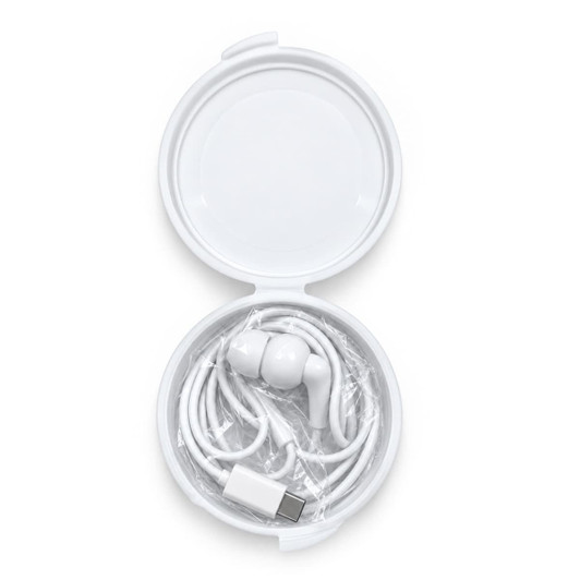 A white circular case containing white Type C earbuds with a charging cable, neatly arranged inside.