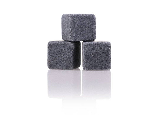 A set of three grey granite drink stones, designed for chilling beverages without dilution.