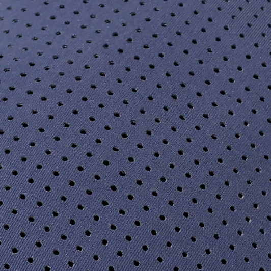 A navy premium nylon cap featuring a breathable perforated design and a logo.