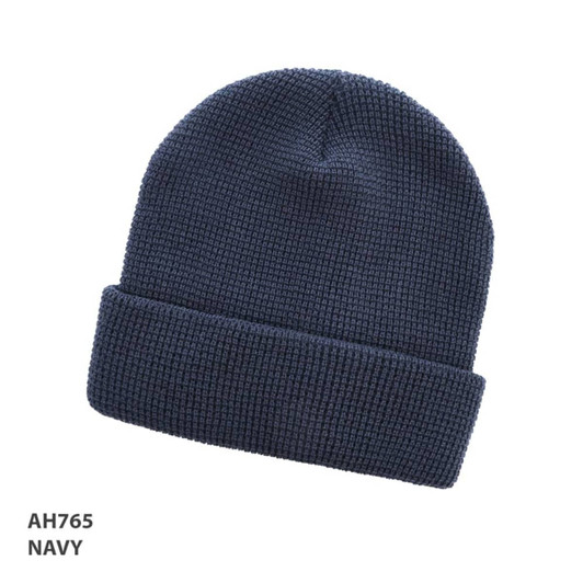 A navy grid knit beanie with a folded cuff and a textured pattern. It features a logo on the side.